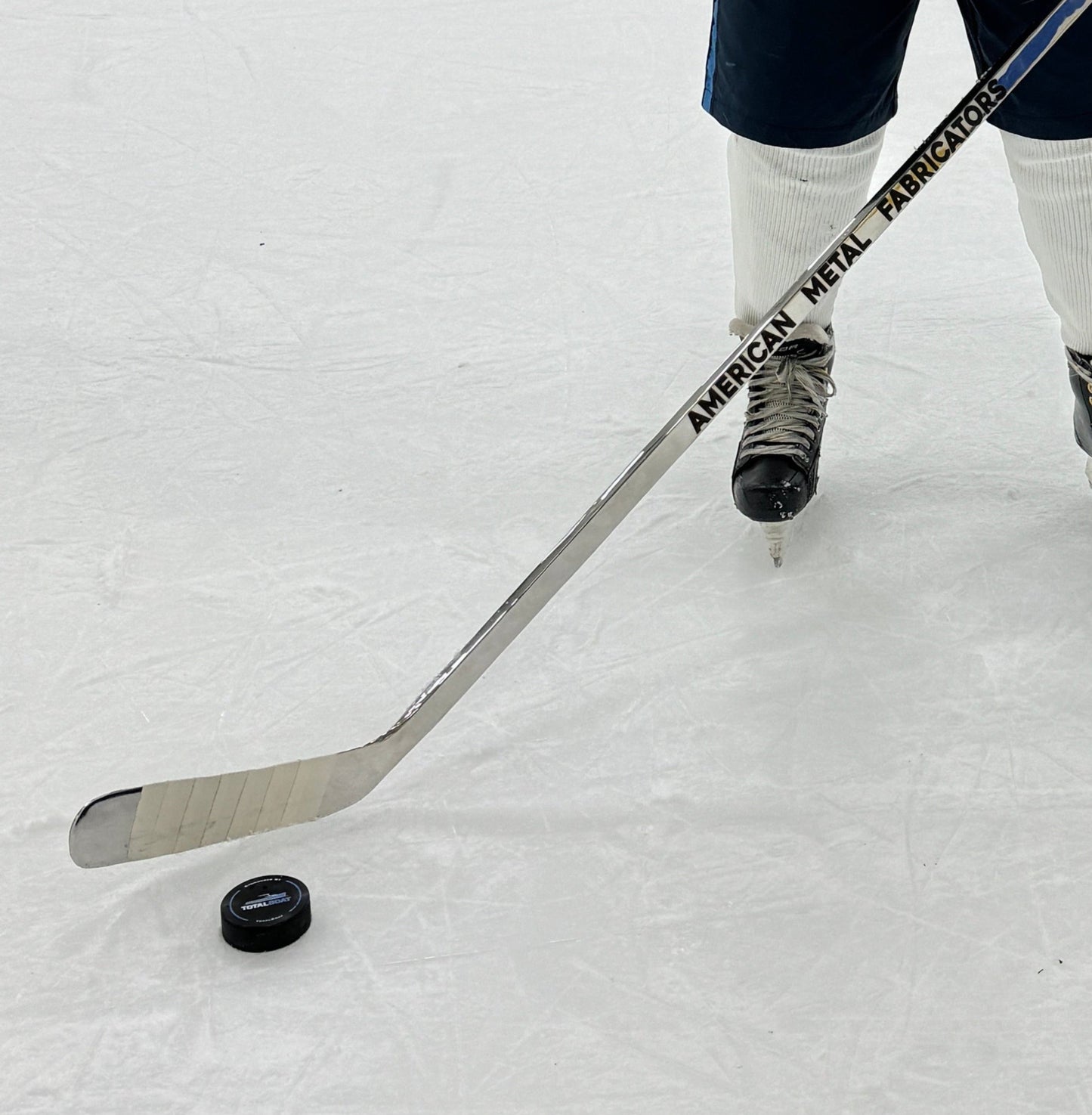 Mirror Polished Stainless Steel Hockey Stick Sculpture